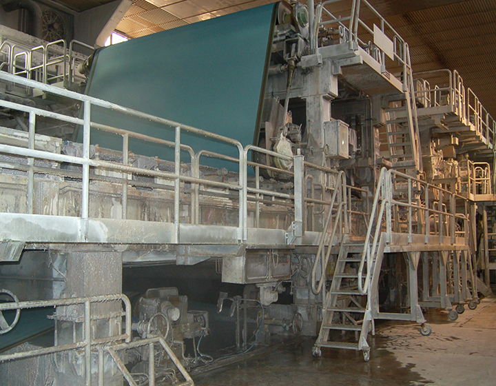 A grey concrete factory on multiple levels