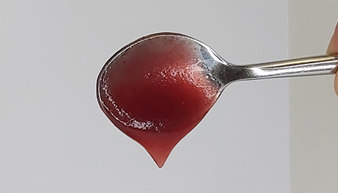 NOVATION 9460 red jam on a metal spoon