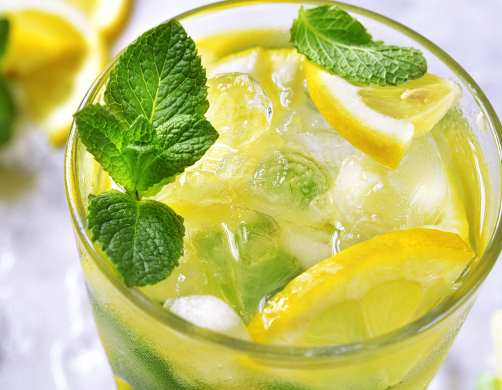 Lemonade with lemon and mint garnish