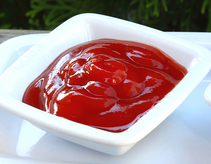 A small bowl of red tomato sauce