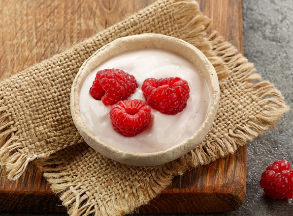 bowl of yogurt with raspberries