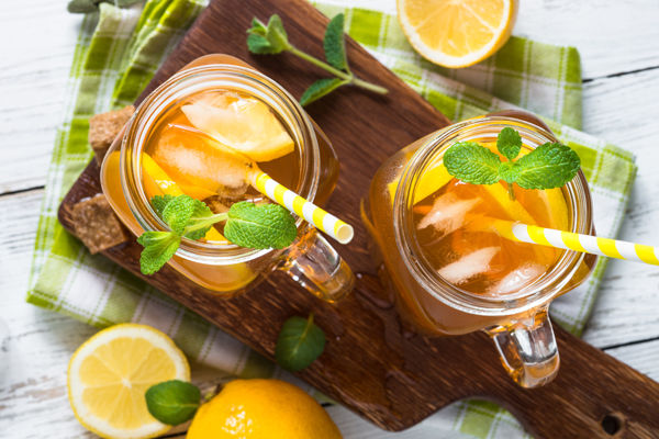 Iced tea with lemon. Refreshment cold summer drink. Top view.