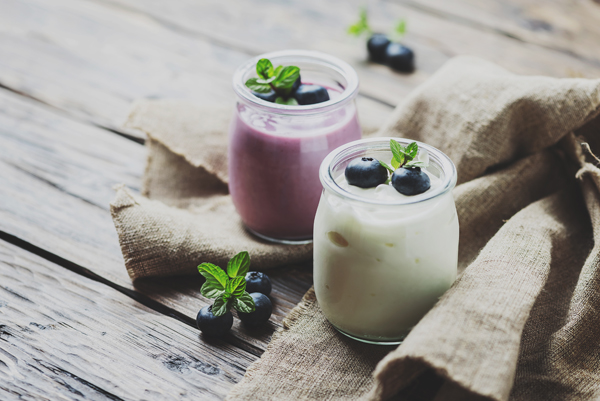 Homemade yogurt with blueberry and mint, selective focus and toned image