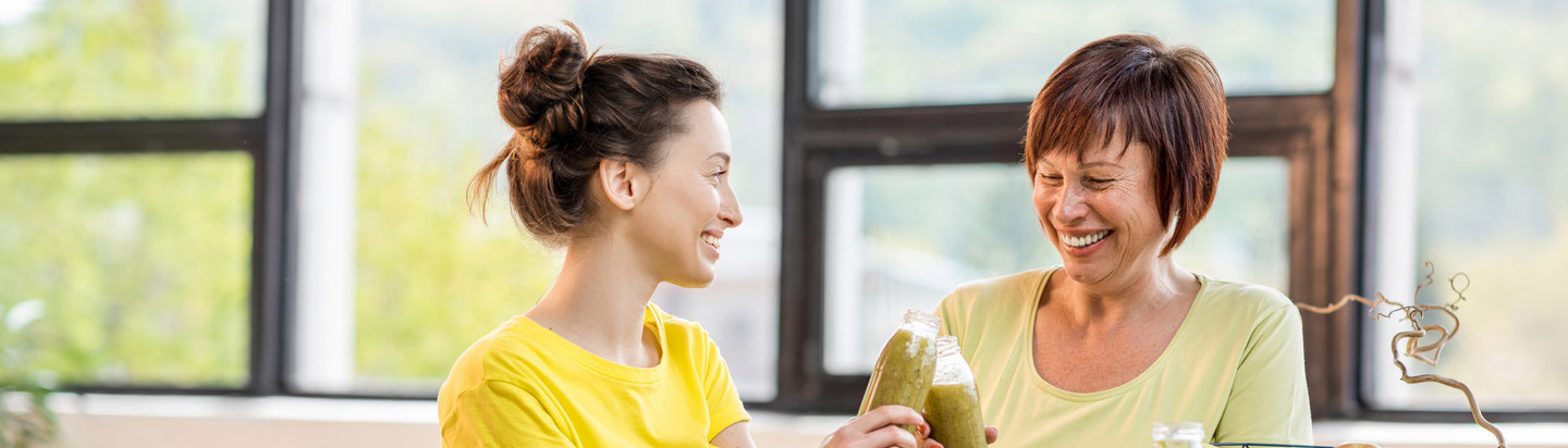 Two women with healthy smoothies