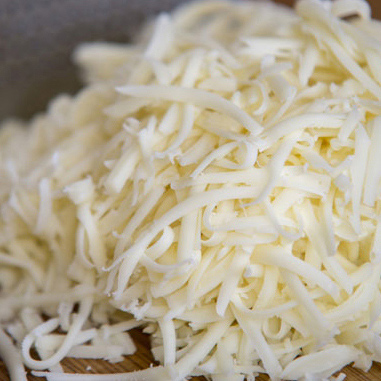 Plant-based shredded cheese