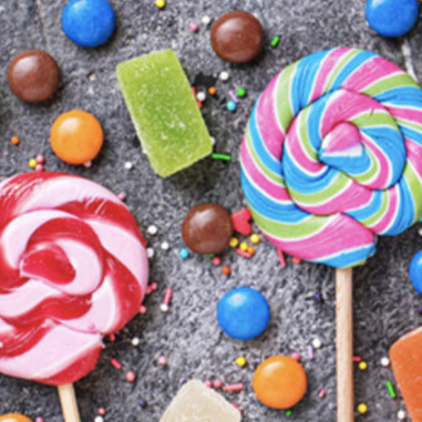 Sugar-reduced lollipops and gummies
