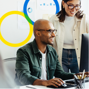 A person and person looking at a computer AI-generated content may be incorrect.